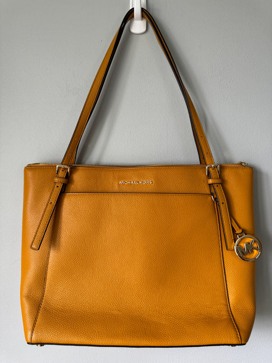 Pre Owned Authentic Michael Kors Voyager East West Tote in Marigold Yellow Leather